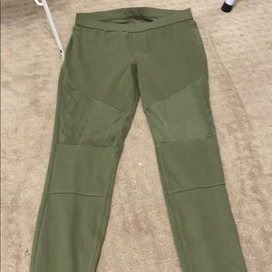 green stretchy pants